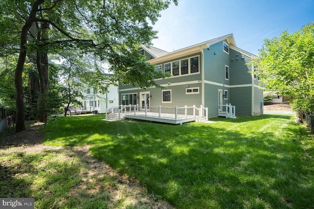 504 Kingsley Rd SW, Vienna, VA 22180 - back of house with a lawn and a wooden deck