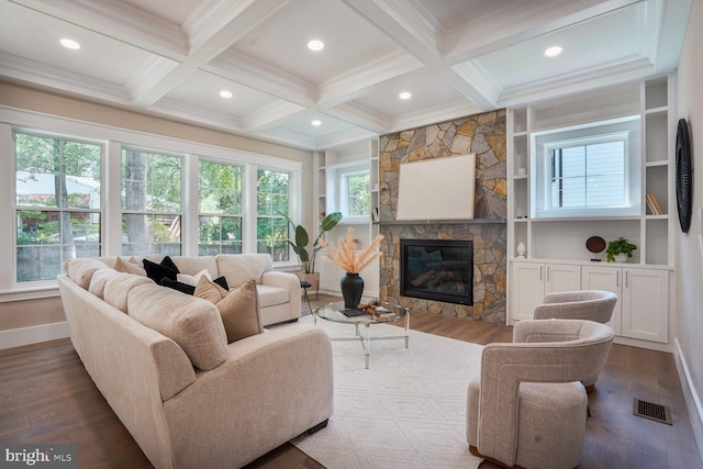 504 Kingsley Rd SW, Vienna, VA 22180 - living room featuring wood finished floors, a stone fireplace, coffered ceiling, recessed lighting, and beamed ceiling