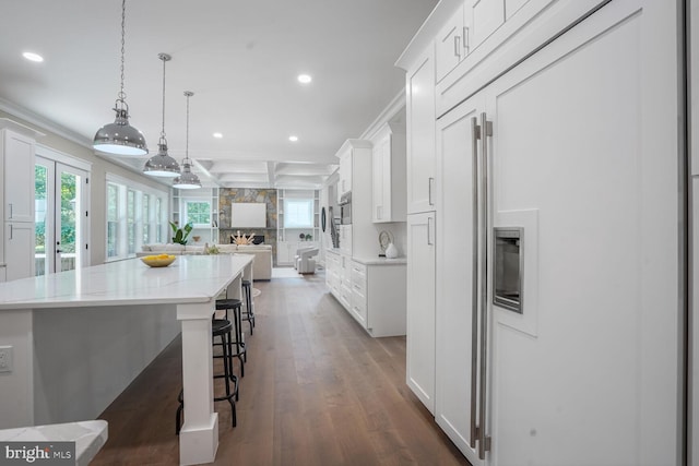 504 Kingsley Rd SW, Vienna, VA 22180 - kitchen featuring paneled built in refrigerator, open floor plan, recessed lighting, crown molding, and white cabinetry