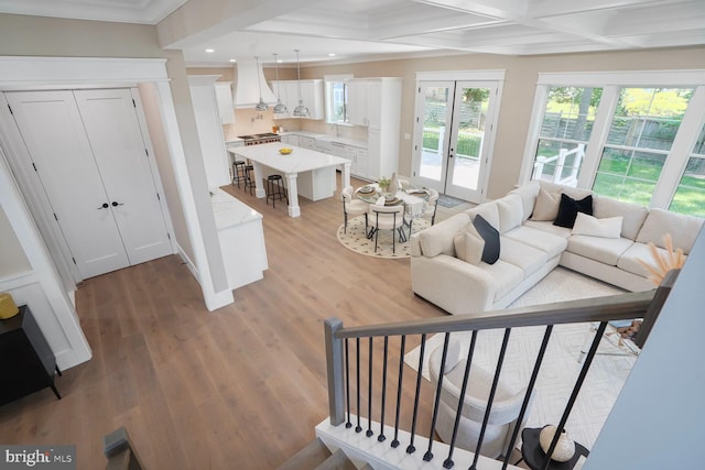 504 Kingsley Rd SW, Vienna, VA 22180 - living area with crown molding, healthy amount of natural light, light wood-type flooring, recessed lighting, and coffered ceiling