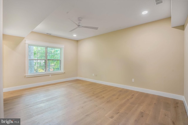 504 Kingsley Rd SW, Vienna, VA 22180 - empty room with light wood finished floors, a ceiling fan, and recessed lighting