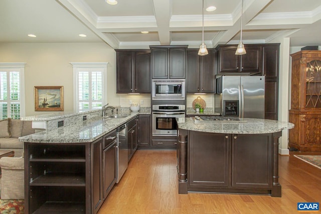 2105 Avinity Loop, Charlottesville, VA 22902 - kitchen with stainless steel appliances, a sink, open shelves, dark brown cabinets, and light wood finished floors