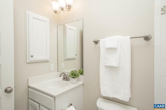 2105 Avinity Loop, Charlottesville, VA 22902 - bathroom featuring vanity, toilet, and a chandelier