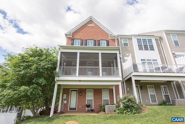 2105 Avinity Loop, Charlottesville, VA 22902 - view of front of home with brick siding, cooling unit, and a sunroom