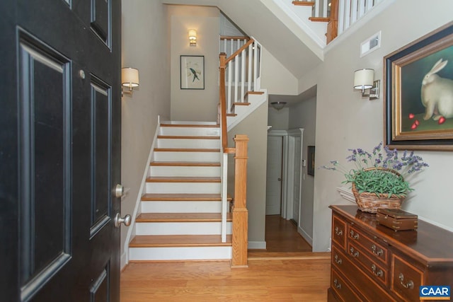 2105 Avinity Loop, Charlottesville, VA 22902 - foyer with light wood-style flooring, stairs, and a high ceiling