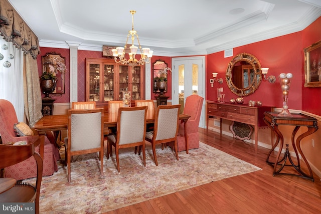 103 Marian Dr, Princeton Junction, NJ 08550 - dining room with a chandelier, a raised ceiling, wood finished floors, and crown molding