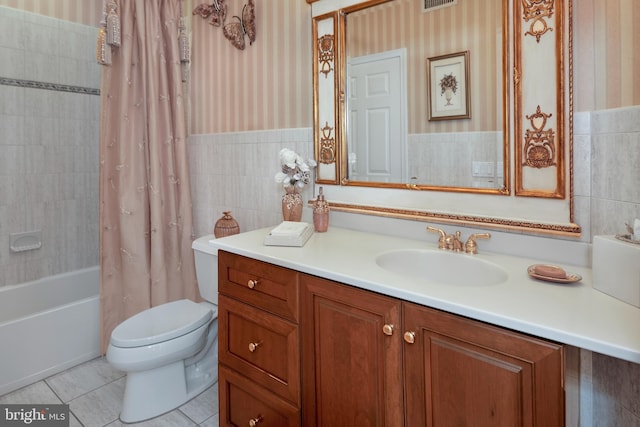 103 Marian Dr, Princeton Junction, NJ 08550 - full bathroom with vanity, tile walls, shower / tub combo, a wainscoted wall, and tile patterned floors
