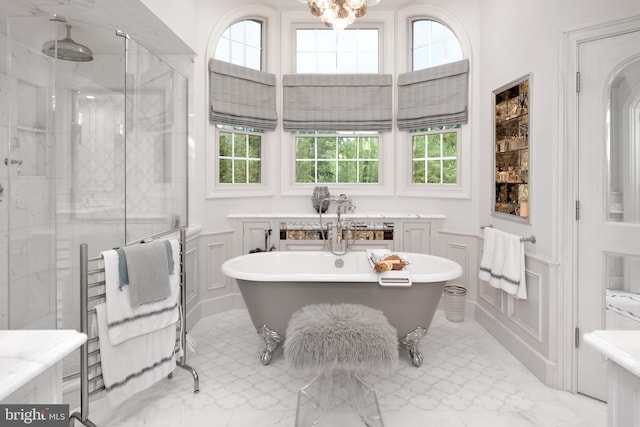 103 Marian Dr, Princeton Junction, NJ 08550 - full bath with a decorative wall, a shower stall, a freestanding bath, and a wainscoted wall