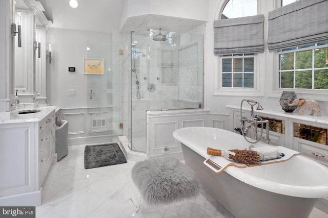103 Marian Dr, Princeton Junction, NJ 08550 - bathroom featuring a decorative wall, a shower stall, vanity, marble tiled flooring, and a soaking tub