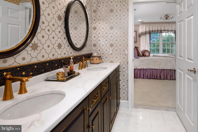 103 Marian Dr, Princeton Junction, NJ 08550 - ensuite bathroom with wallpapered walls, double vanity, and tile patterned flooring