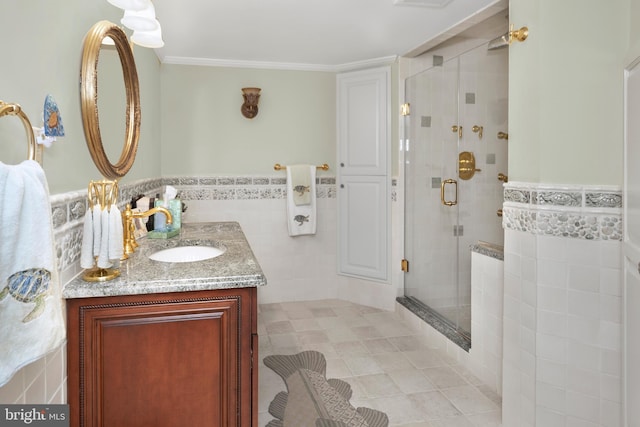103 Marian Dr, Princeton Junction, NJ 08550 - bathroom featuring tile walls, a stall shower, vanity, a wainscoted wall, and tile patterned flooring