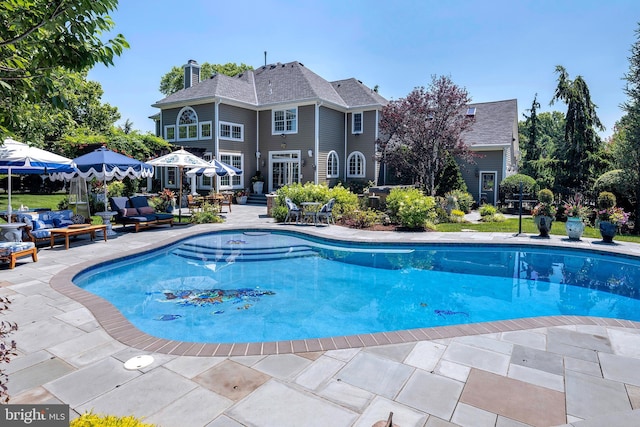 103 Marian Dr, Princeton Junction, NJ 08550 - outdoor pool featuring a patio area and an outdoor living space