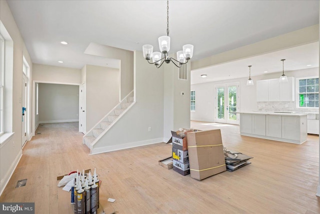 7016 Grace Landing Ct, Hughesville, MD 20637 - dining space with light wood-style floors, stairs, recessed lighting, and plenty of natural light