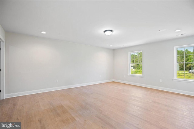7016 Grace Landing Ct, Hughesville, MD 20637 - unfurnished room with healthy amount of natural light, light wood-type flooring, baseboards, and recessed lighting
