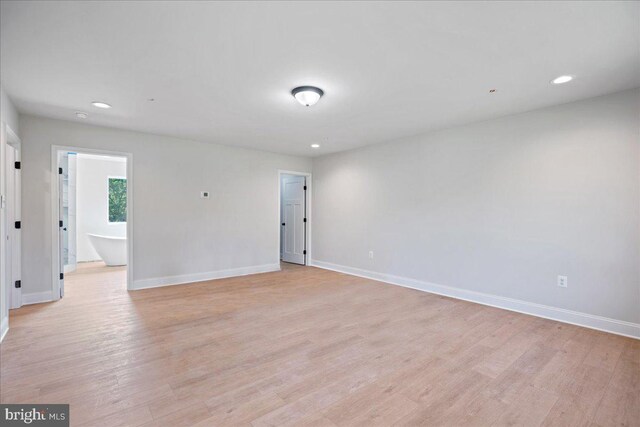 7016 Grace Landing Ct, Hughesville, MD 20637 - empty room with light wood-type flooring, baseboards, and recessed lighting