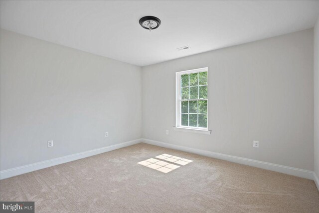 7016 Grace Landing Ct, Hughesville, MD 20637 - carpeted spare room featuring baseboards