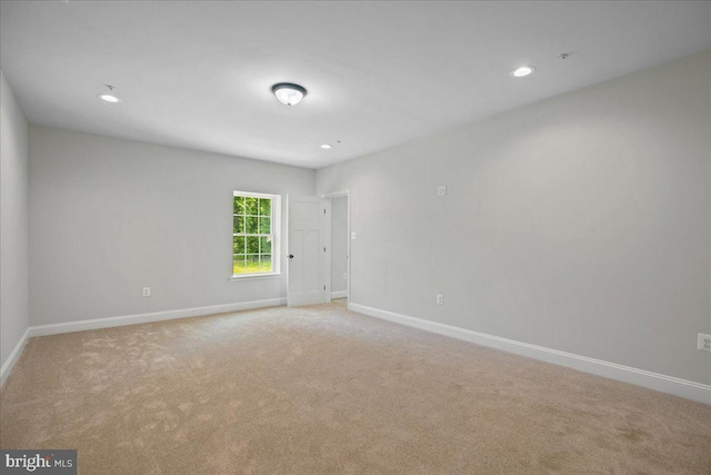 7016 Grace Landing Ct, Hughesville, MD 20637 - spare room featuring light carpet, baseboards, and recessed lighting