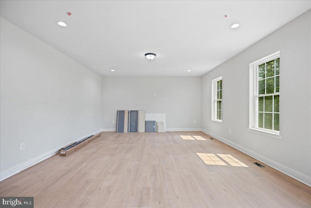 7016 Grace Landing Ct, Hughesville, MD 20637 - unfurnished living room with baseboards, light wood-type flooring, and recessed lighting