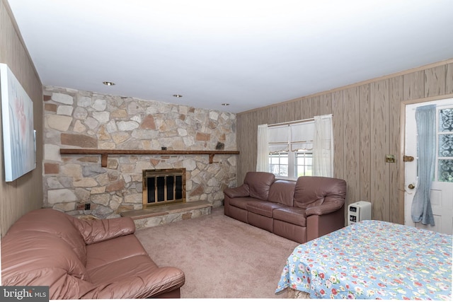 2301 Yellowstone Rd, Cinnaminson, NJ 08077 - carpeted bedroom featuring wood walls and a stone fireplace