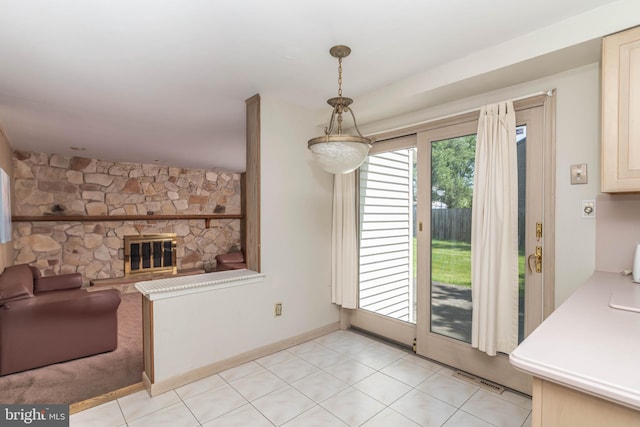 2301 Yellowstone Rd, Cinnaminson, NJ 08077 - unfurnished dining area with a fireplace and baseboards