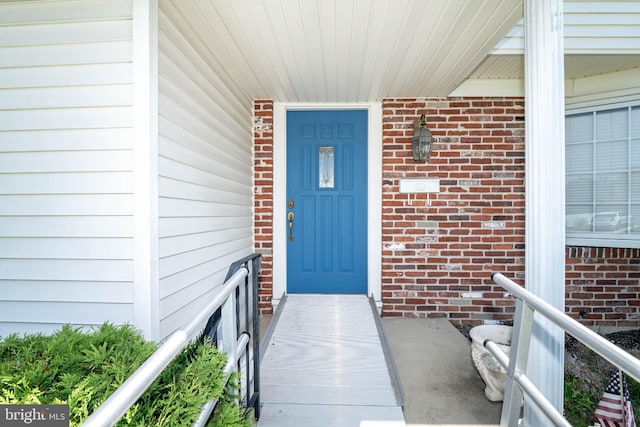 2301 Yellowstone Rd, Cinnaminson, NJ 08077 - view of exterior entry featuring brick siding
