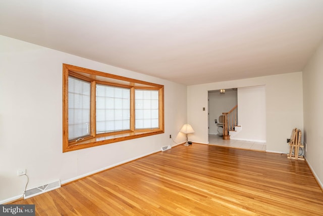 2301 Yellowstone Rd, Cinnaminson, NJ 08077 - spare room with stairway and light wood finished floors