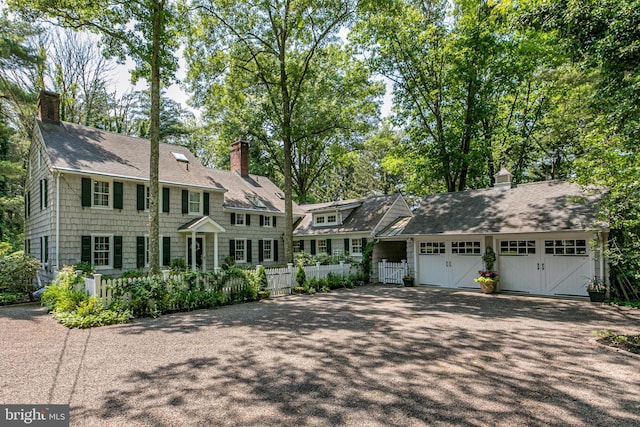200 Hun Rd, Princeton, NJ 08540 - view of front of home featuring driveway, a chimney, an attached garage, and a shingled roof