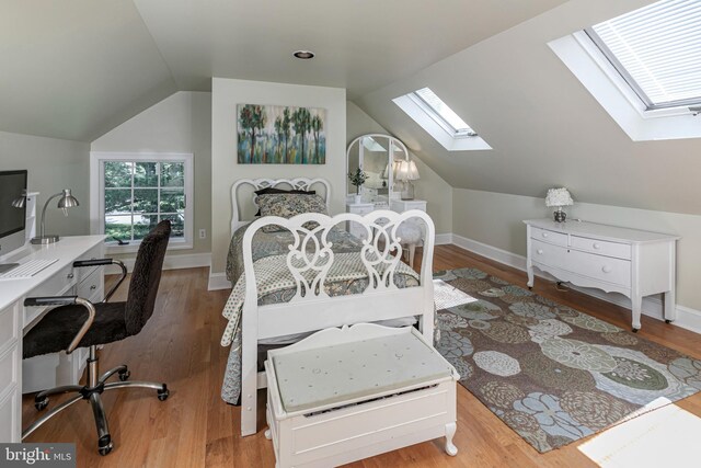 200 Hun Rd, Princeton, NJ 08540 - bedroom featuring a skylight, lofted ceiling, wood finished floors, and a desk