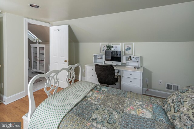 200 Hun Rd, Princeton, NJ 08540 - bedroom with baseboards, wood finished floors, and vaulted ceiling