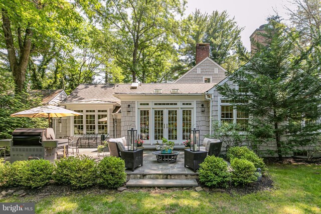 200 Hun Rd, Princeton, NJ 08540 - rear view of house with french doors, a patio, a chimney, and roof with shingles