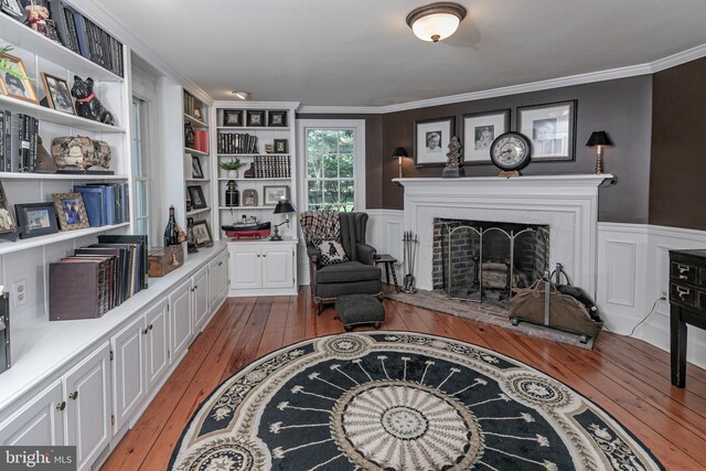 200 Hun Rd, Princeton, NJ 08540 - living area featuring hardwood / wood-style floors, a fireplace, crown molding, and built in features