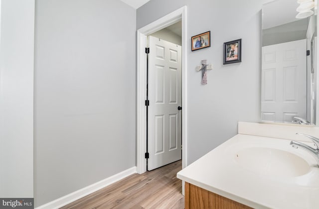 2 Lenox Ct, Mechanicsburg, PA 17050 - bathroom featuring vanity, wood finished floors, and baseboards