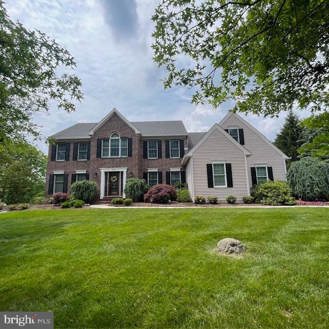 1359 Michael Way, Lansdale, PA 19446 - colonial-style house featuring a front lawn and brick siding