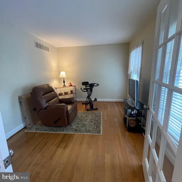1359 Michael Way, Lansdale, PA 19446 - living area featuring hardwood / wood-style flooring and baseboards