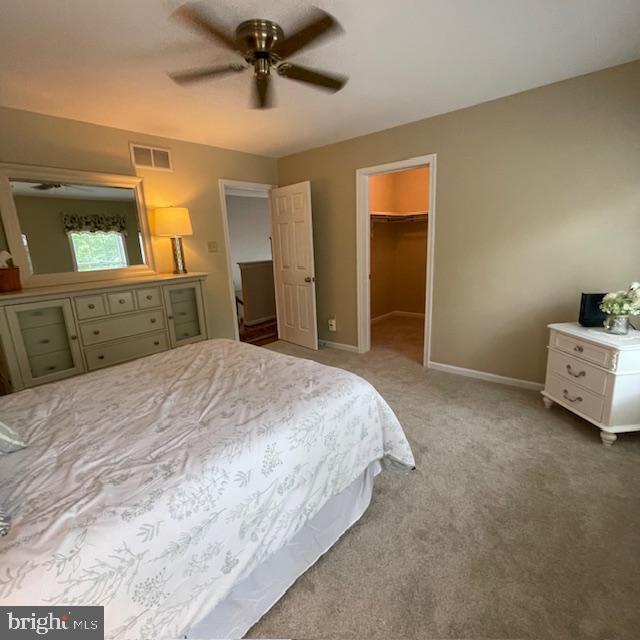 1359 Michael Way, Lansdale, PA 19446 - bedroom featuring carpet, baseboards, a spacious closet, a ceiling fan, and a closet