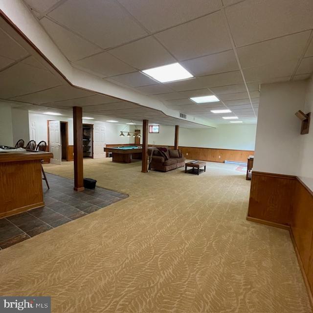 1359 Michael Way, Lansdale, PA 19446 - finished below grade area featuring a paneled ceiling, pool table, dark carpet, wainscoting, and wood walls