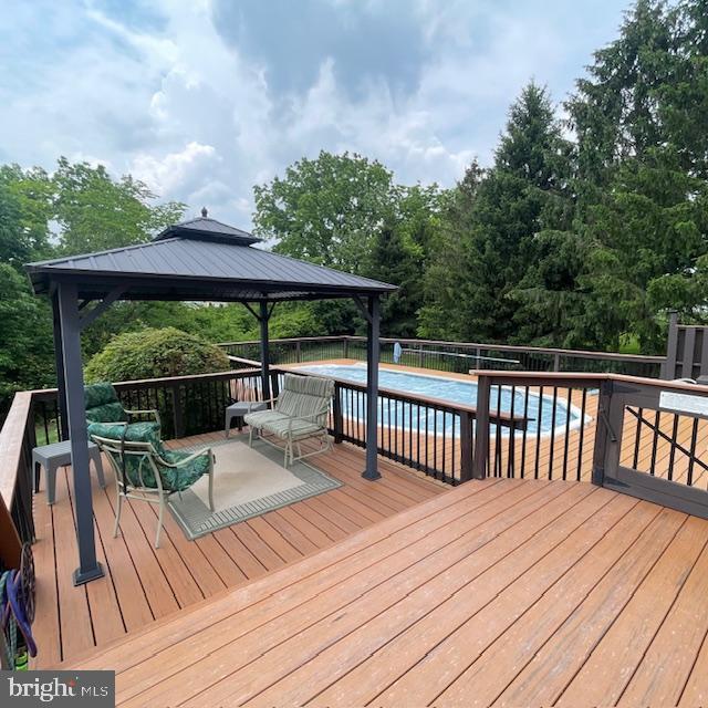 1359 Michael Way, Lansdale, PA 19446 - wooden terrace featuring a gazebo and view of scattered trees
