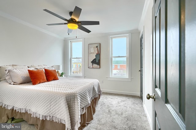 837 W 33rd St, Baltimore, MD 21211 - bedroom with baseboards, light colored carpet, multiple windows, crown molding, and a ceiling fan