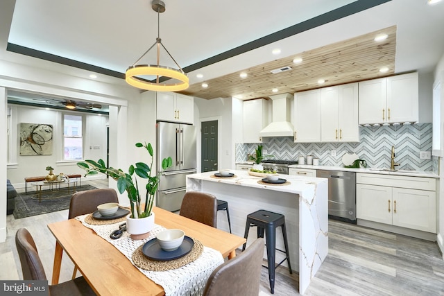 837 W 33rd St, Baltimore, MD 21211 - dining room with light wood-style flooring, recessed lighting, and ceiling fan