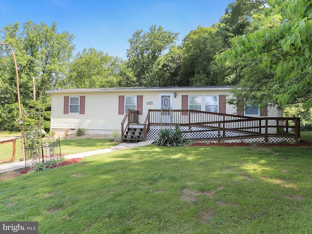 18540 Brooke Rd, Sandy Spring, MD 20860 - manufactured / mobile home with a deck, a front yard, and crawl space