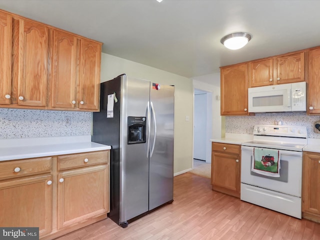 18540 Brooke Rd, Sandy Spring, MD 20860 - kitchen with white appliances, light countertops, tasteful backsplash, and light wood-type flooring