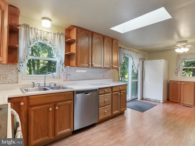 18540 Brooke Rd, Sandy Spring, MD 20860 - kitchen with dishwasher, open shelves, a sink, freestanding refrigerator, and a skylight