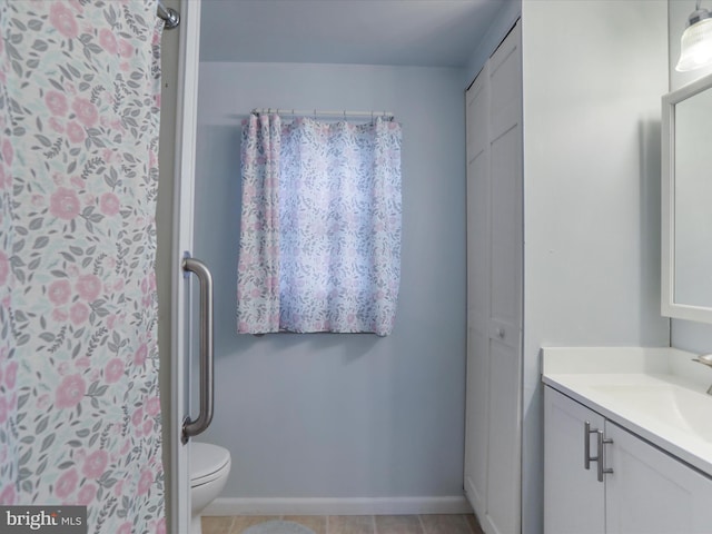 18540 Brooke Rd, Sandy Spring, MD 20860 - bathroom featuring vanity, toilet, tile patterned flooring, a shower with curtain, and baseboards