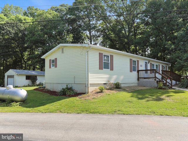 18540 Brooke Rd, Sandy Spring, MD 20860 - view of front of home with crawl space, a front lawn, and view of scattered trees
