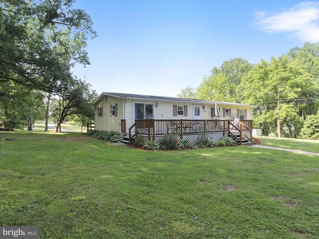 18540 Brooke Rd, Sandy Spring, MD 20860 - manufactured / mobile home featuring a front yard and a deck