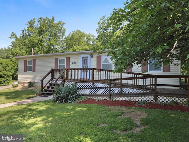 18540 Brooke Rd, Sandy Spring, MD 20860 - view of front of home featuring a deck and a front yard