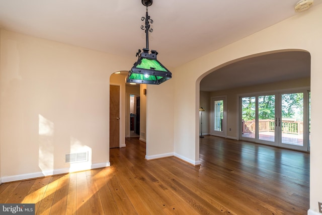 1901 Acorn Ln, Abington, PA 19001 - spare room with arched walkways, wood-type flooring, a smoke detector, and baseboards
