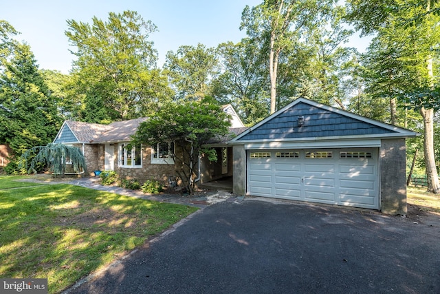1901 Acorn Ln, Abington, PA 19001 - view of front facade with driveway, a front lawn, and stone siding
