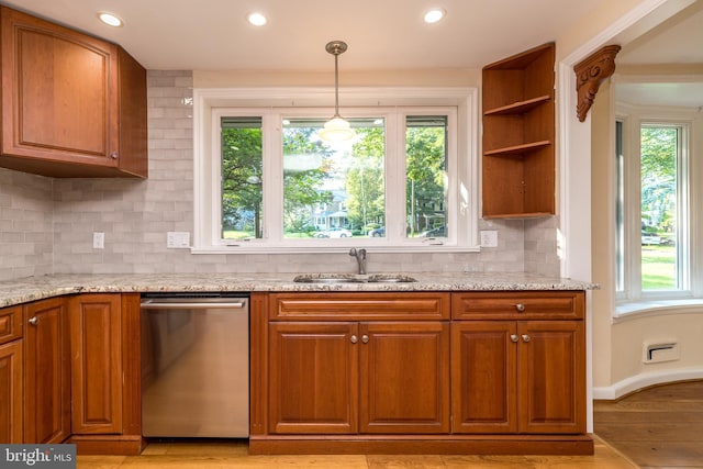 1901 Acorn Ln, Abington, PA 19001 - kitchen featuring stainless steel dishwasher, a sink, brown cabinetry, healthy amount of natural light, and recessed lighting