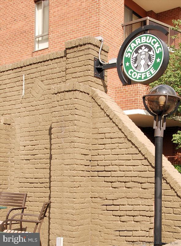 3900 Tunlaw Rd NW Unit 118, Washington, DC 20007 - exterior view of brick siding